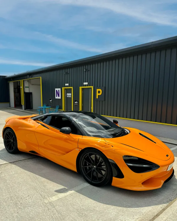 Orange McLaren 720 outside FUZE Visual unit in Colchester